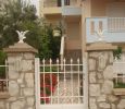 Επένδυση εξωτερικής εισόδου με πέτρα λευκή